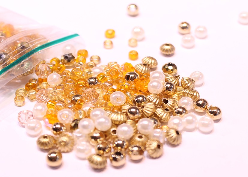 kralenmix 3/4mm oranje